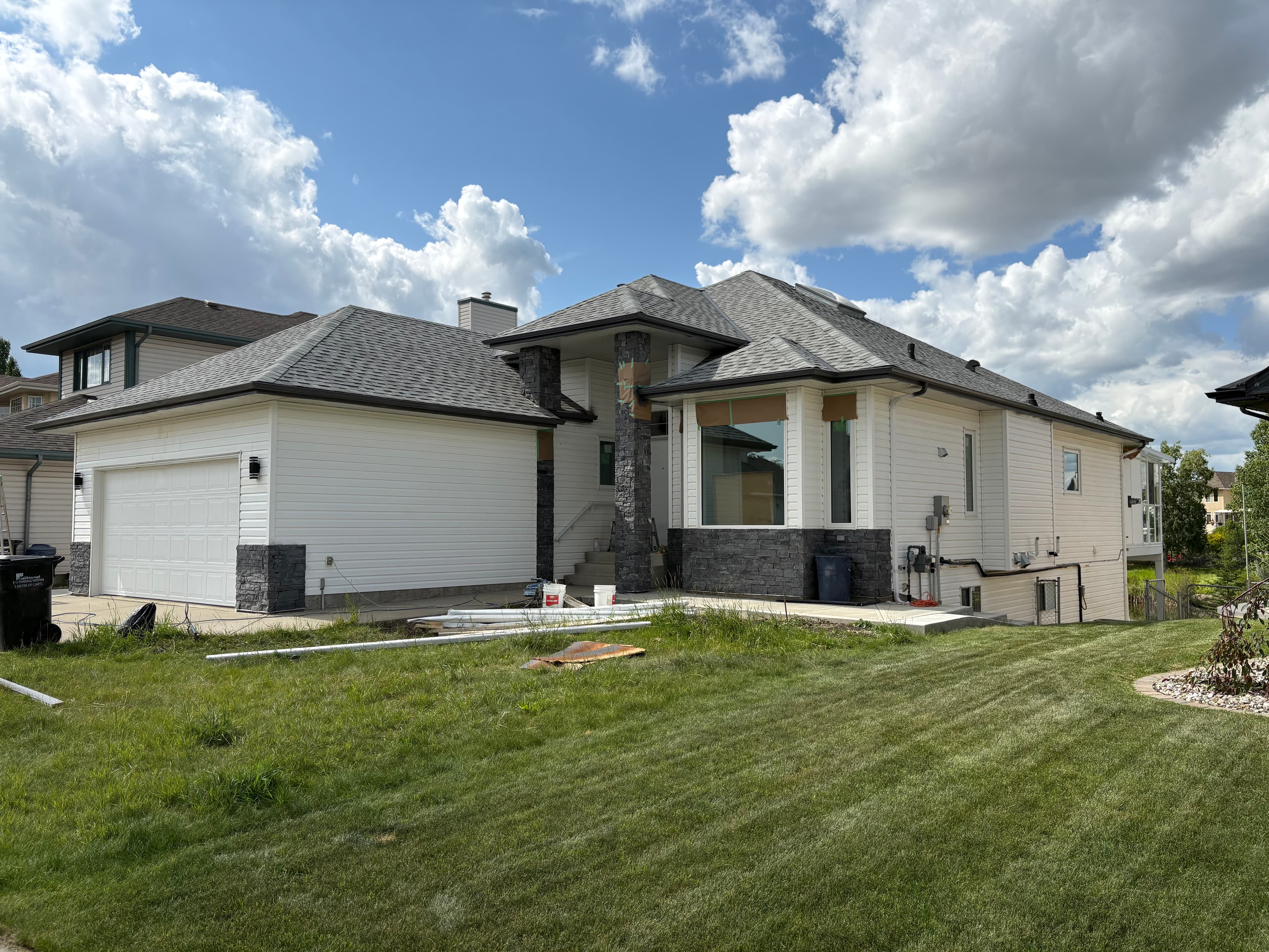 Residential exterior repaint with durable coatings