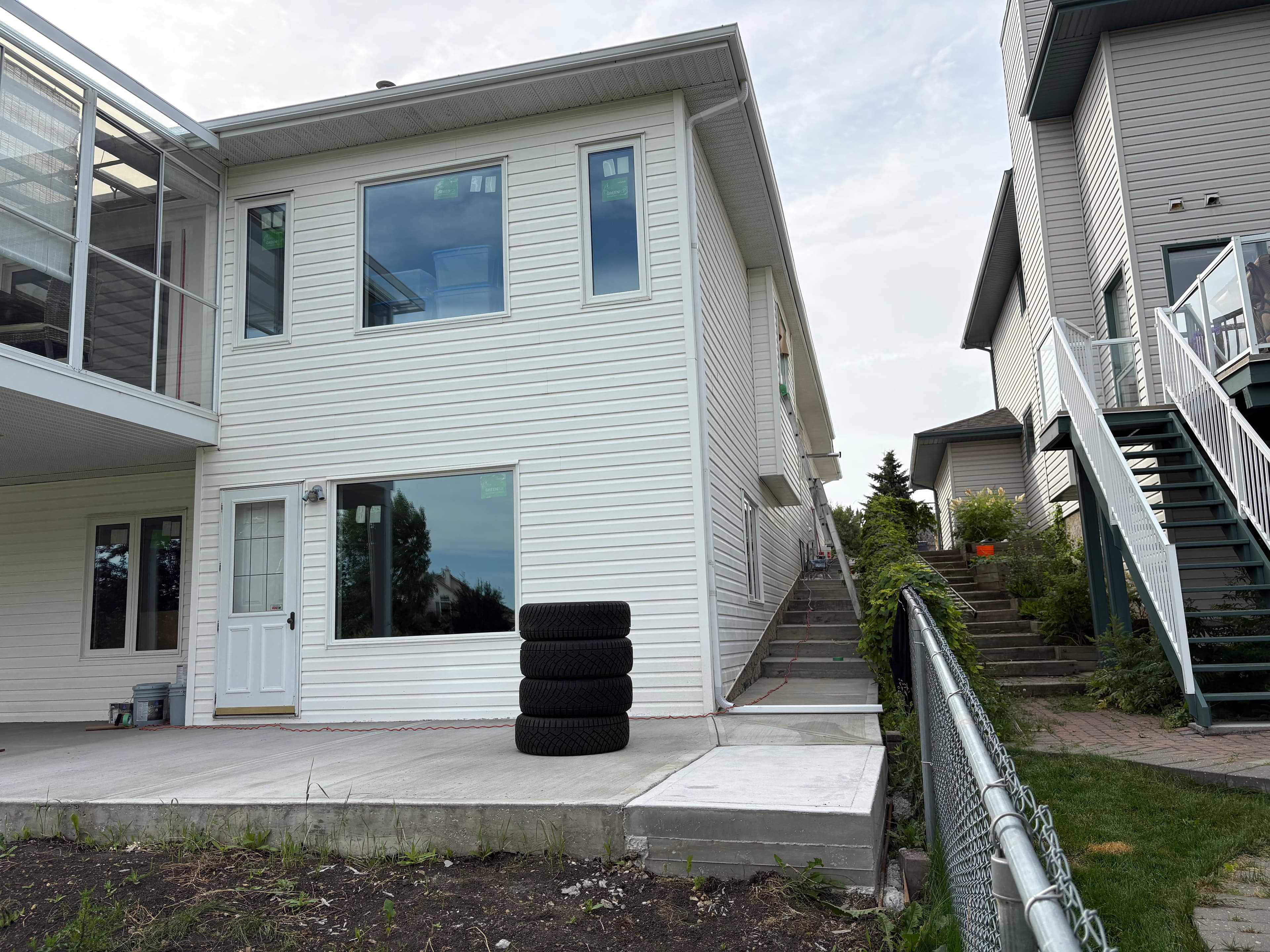 Rear exterior and patio before residential repaint