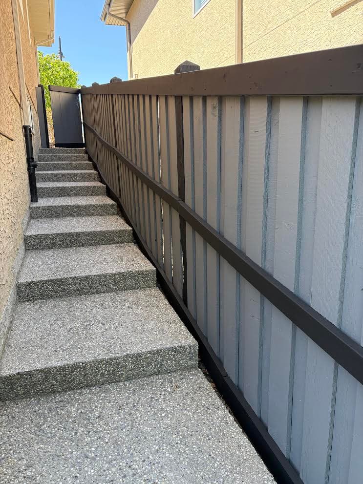 Side yard fence after professional exterior finishing